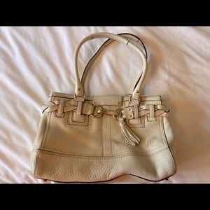 Cream colored leather Coach handbag